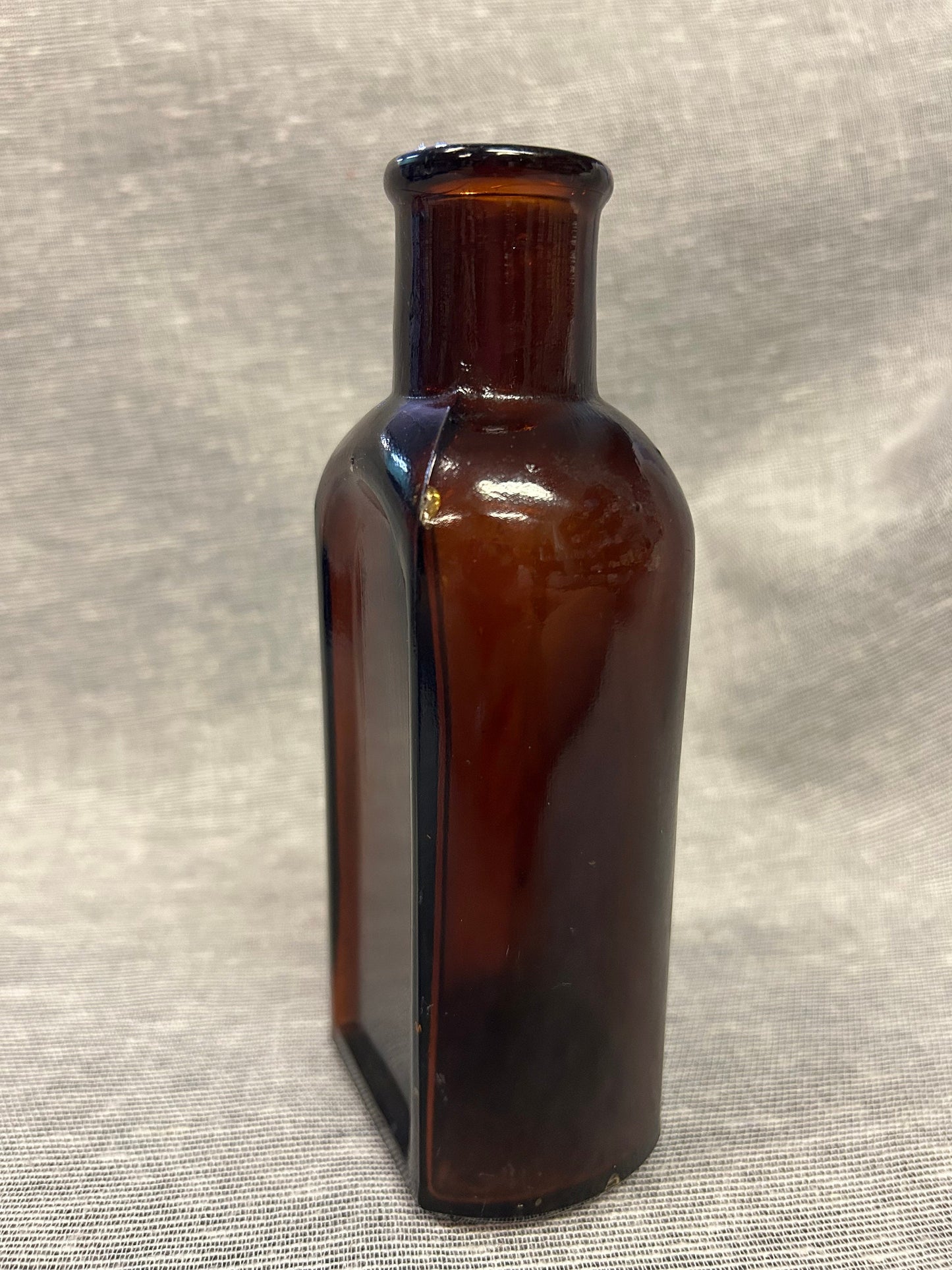 Dark Reddish-Brown Glass Medicine Bottle - Cork and Wire Stopper Style - early 1900s