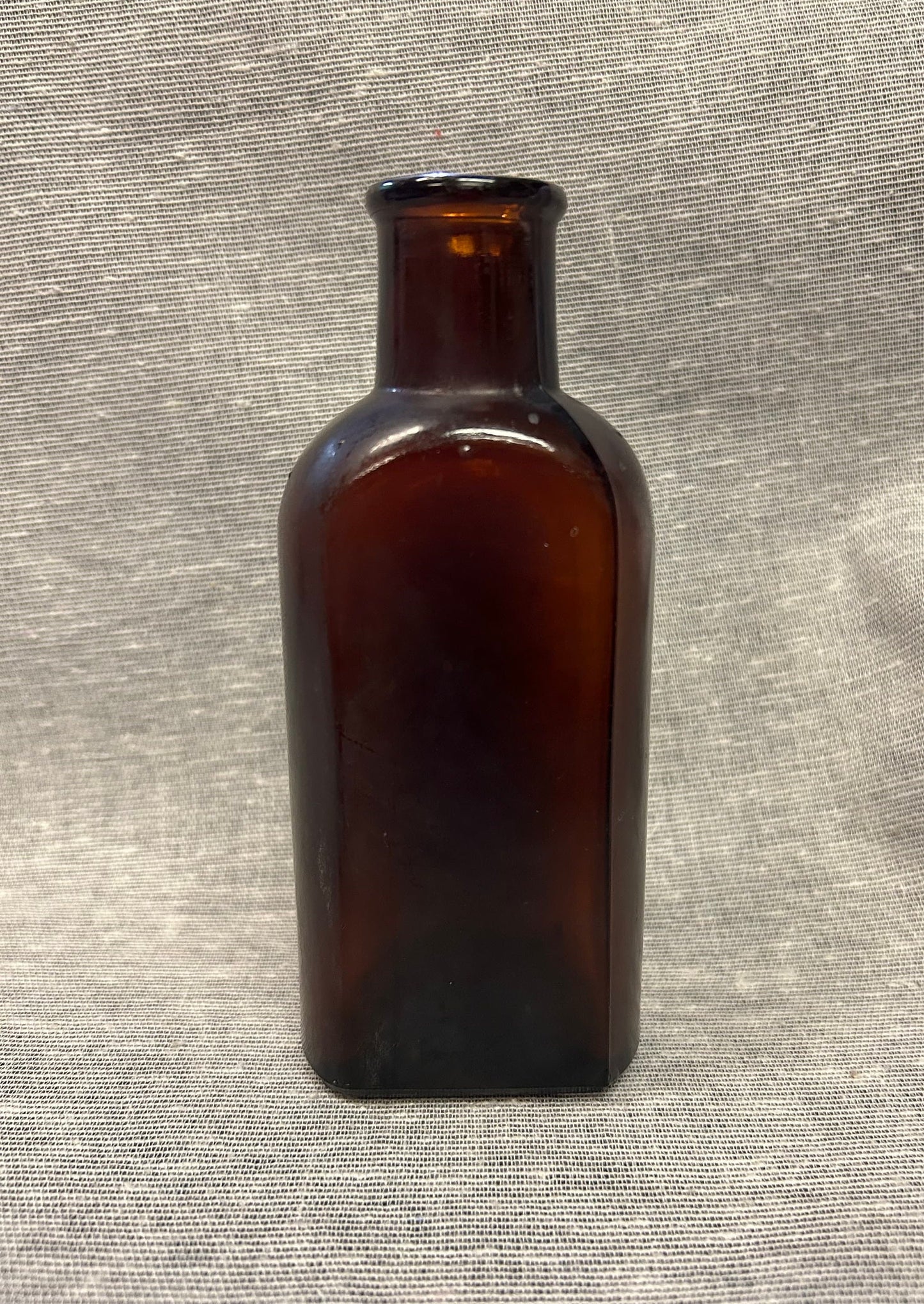 Dark Reddish-Brown Glass Medicine Bottle - Cork and Wire Stopper Style - early 1900s