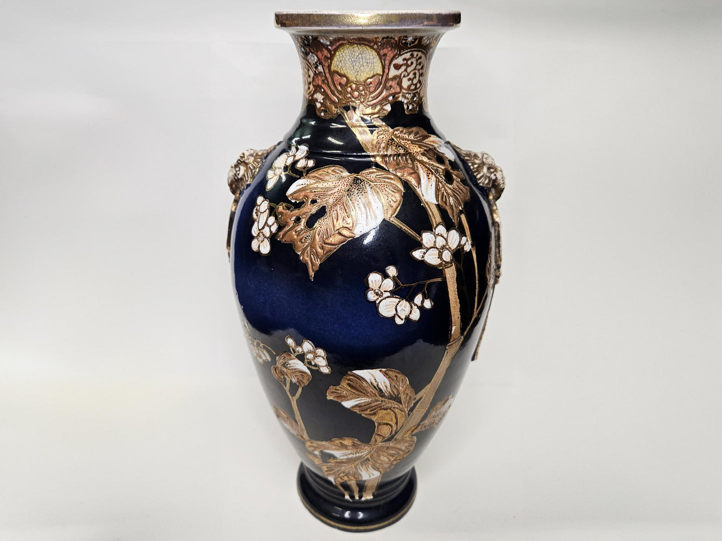 Japanese Cobalt Satsuma Kinkozam Vase with Kenran-de (Gold Paint) on Decorative Relief- 1910 - 1920 Meiji Period- 12.5" w/Elephant Handles