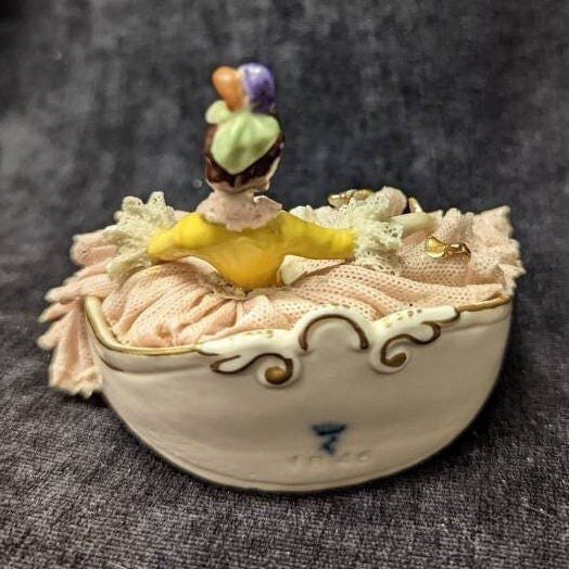 Dresden Porcelain Lace Figurine Sitting on Sofa