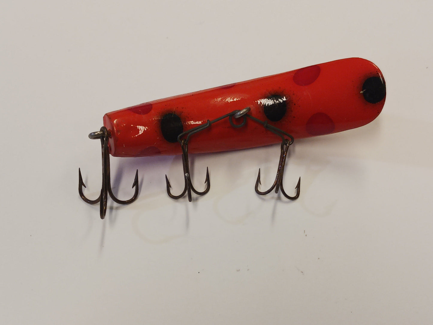 Flatfish Fishing Lure, with quarter for size