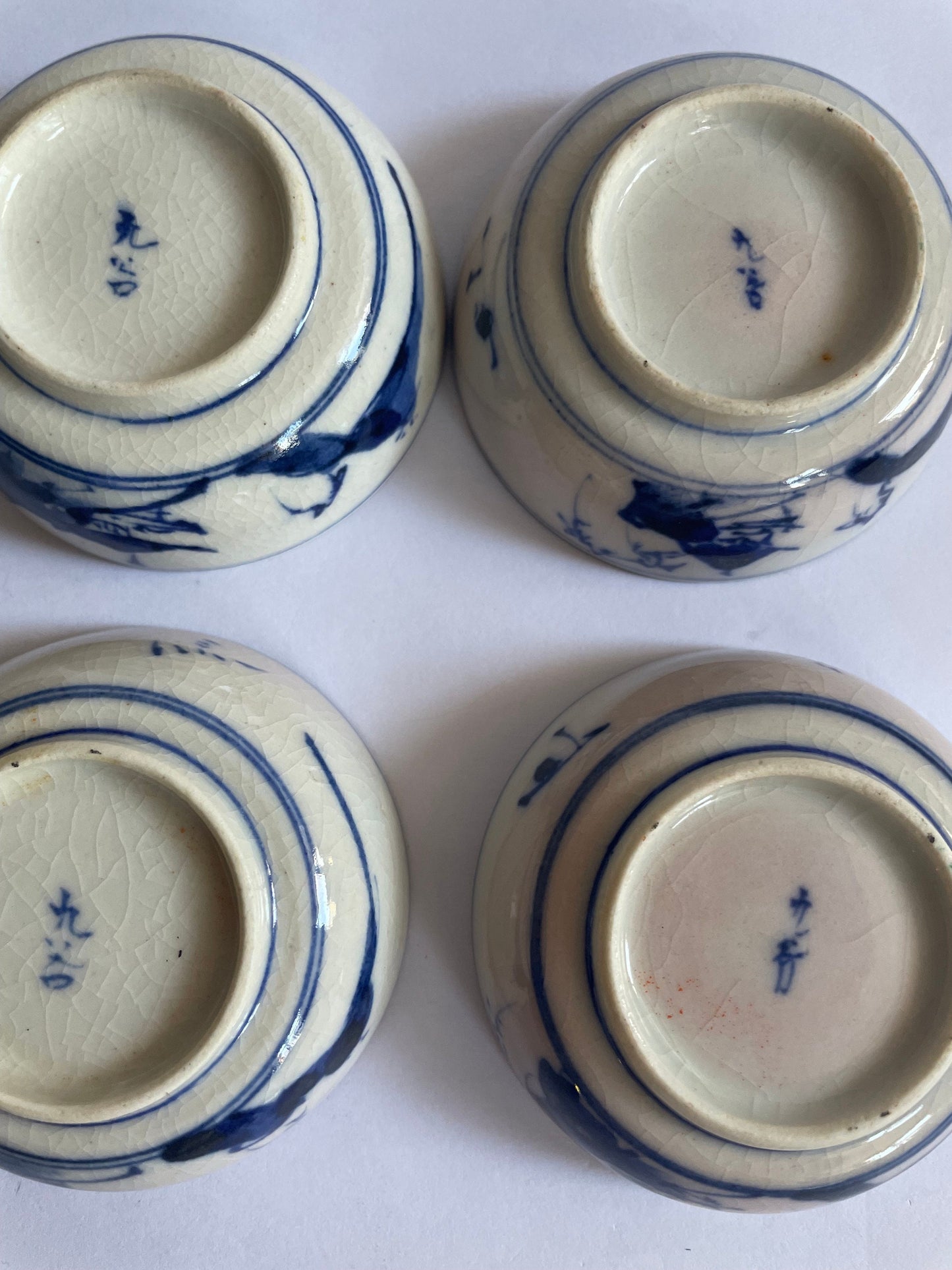 Soy Sauce Dishes with Blue Sometsuke Drawings on outside Baase - Clay Enameled in Morriage Cherry Blossoms  - sold as set of 4 - Vintage 1910 bottoms