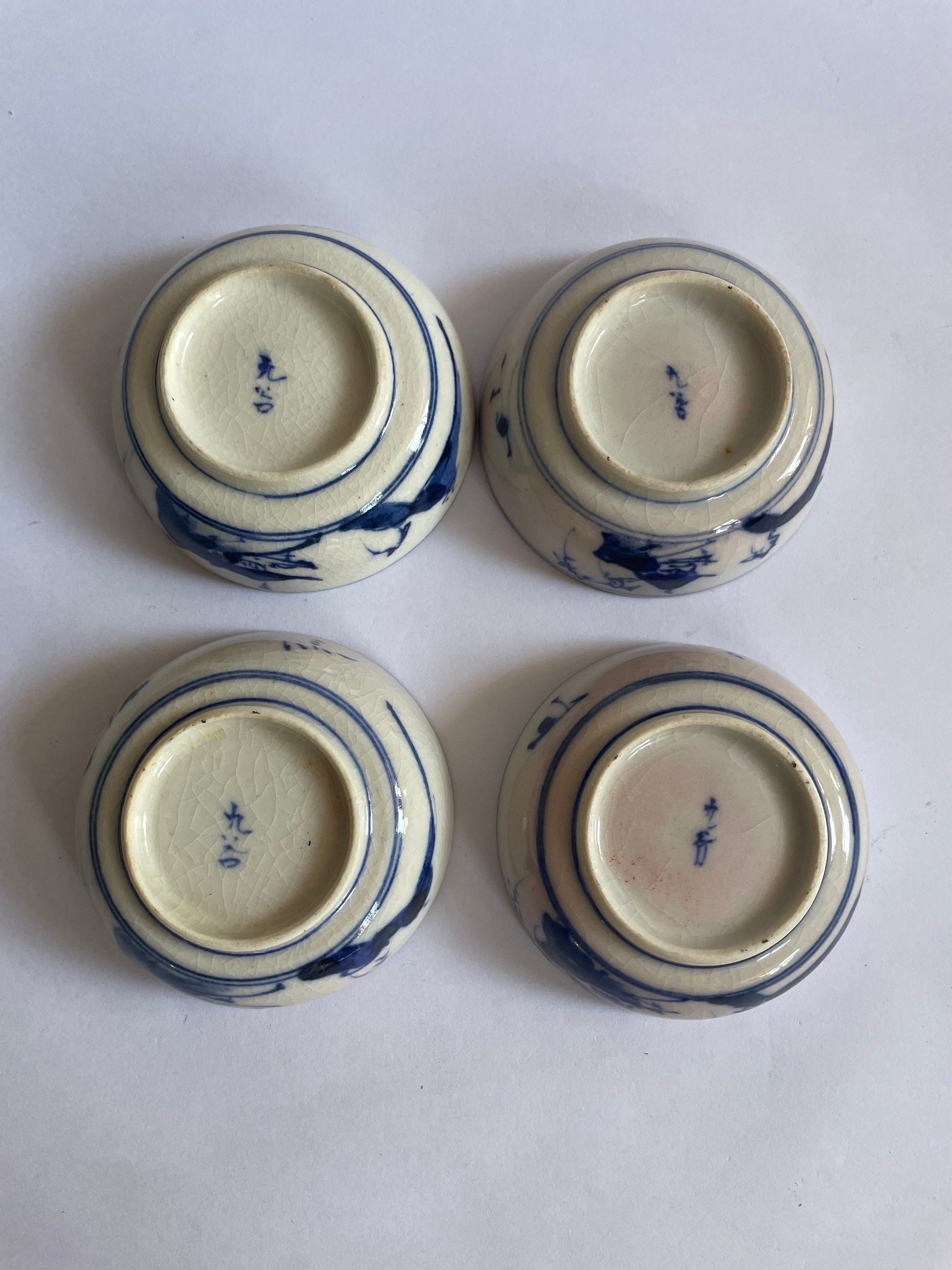 Soy Sauce Dishes with Blue Sometsuke Drawings on outside Baase - Clay Enameled in Morriage Cherry Blossoms  - sold as set of 4 - Vintage 1910, bottoms